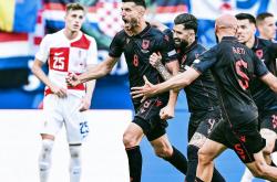 爱游戏登录入口-克罗地亚队在欧洲杯赛事中再现辉煌